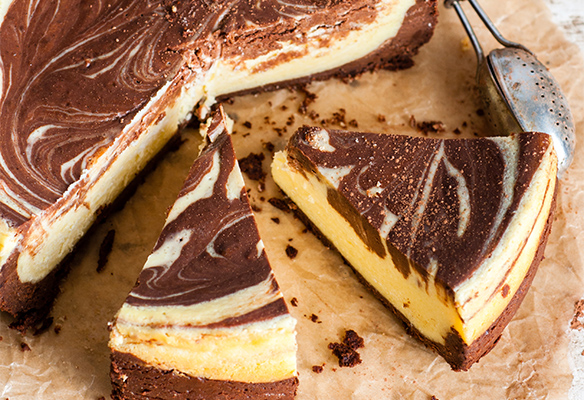 Photo of a cheesecake with a chocolate swirl